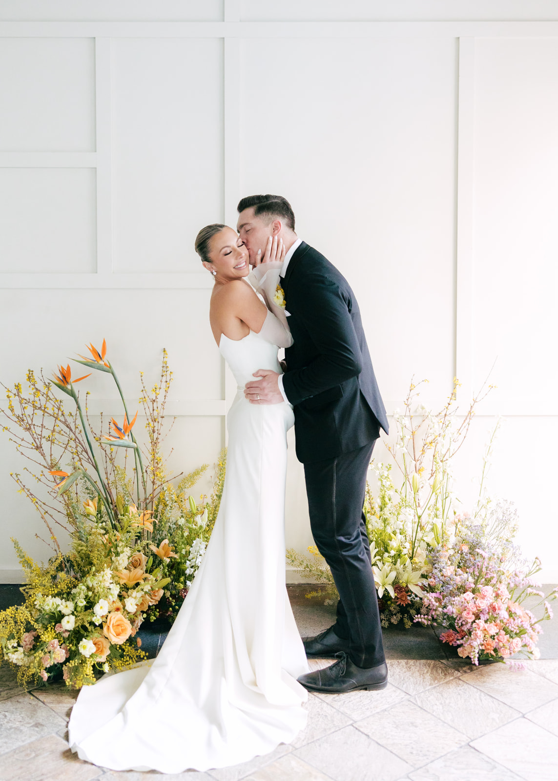 yellow wedding ceremony floral arrangements