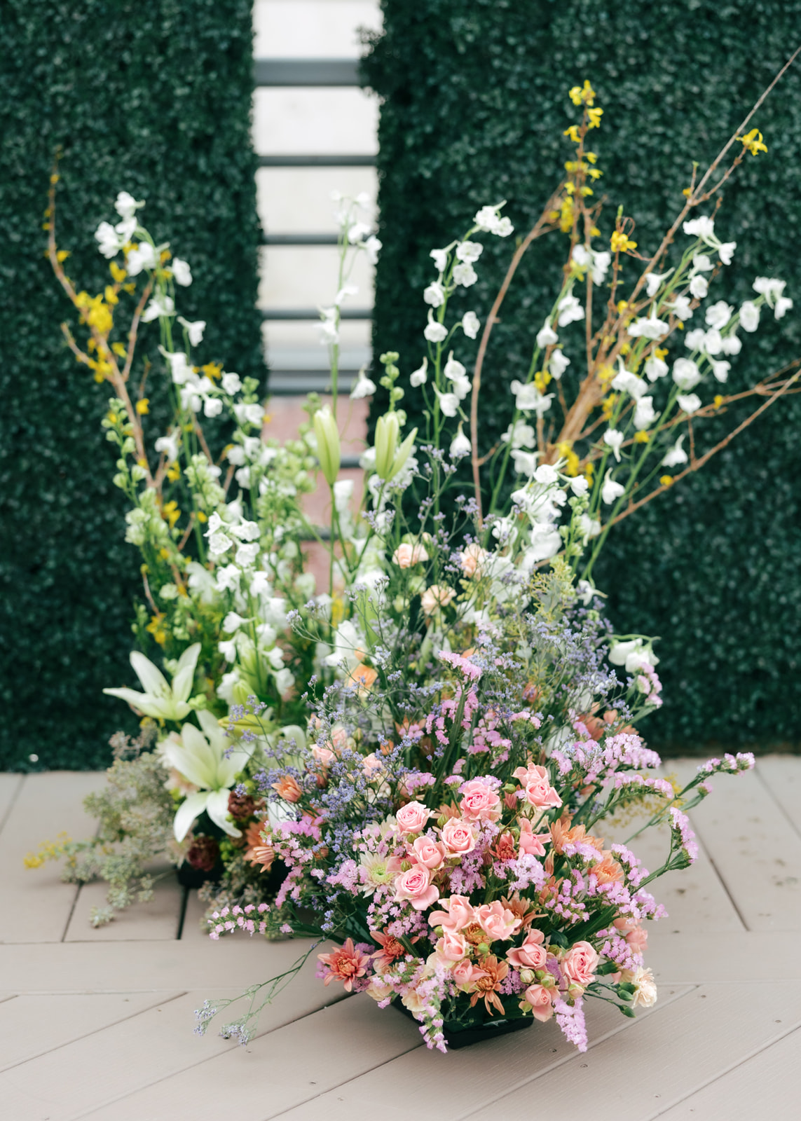 muted rainbow flower arrangement