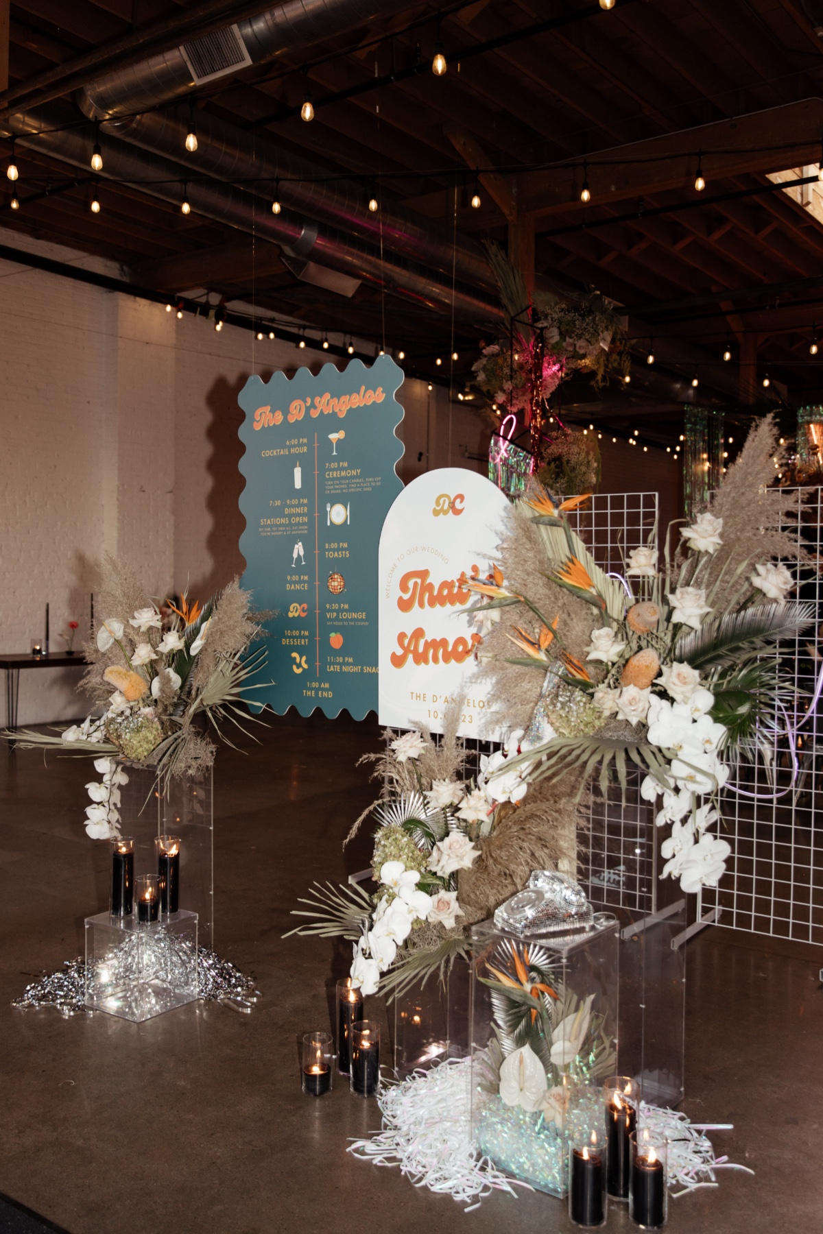 custom modern signage in orange and teal for wedding