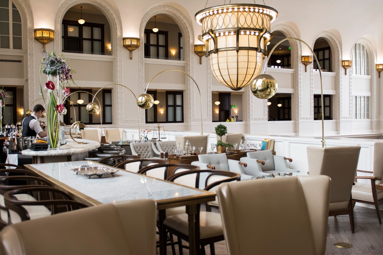 beautifully refurbished white interior of Union station in denver Colorado