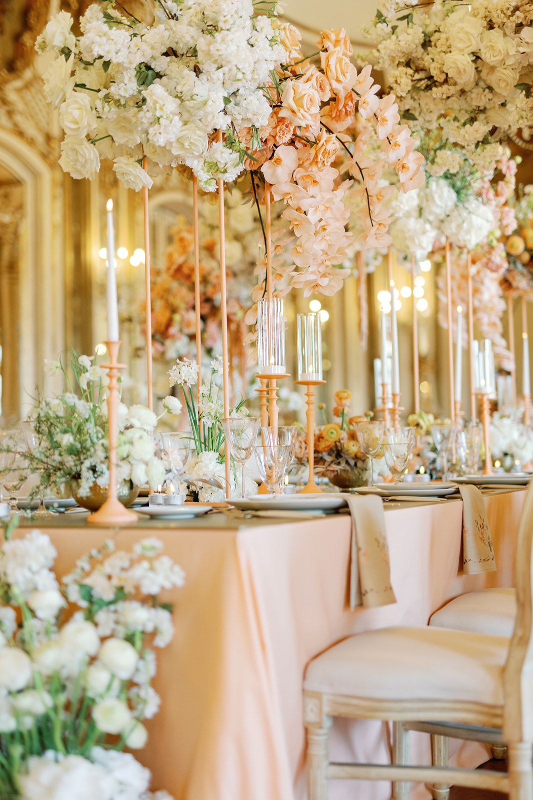 peach and ivory tall wedding floral centerpieces