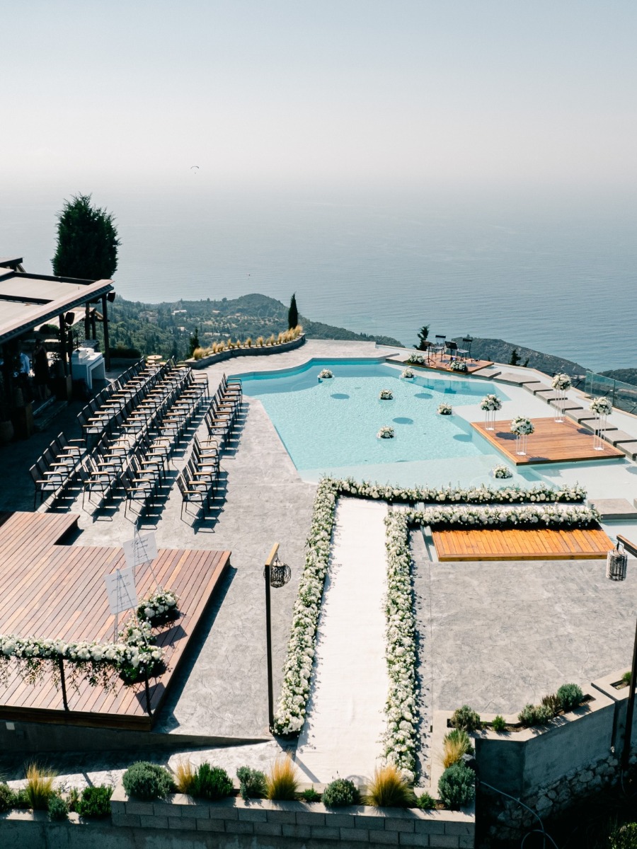 A panoramic sunset wedding at a luxe restaurant in the Greek islands