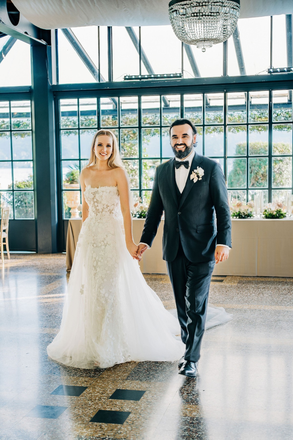 bride and groom at greenhouse reception