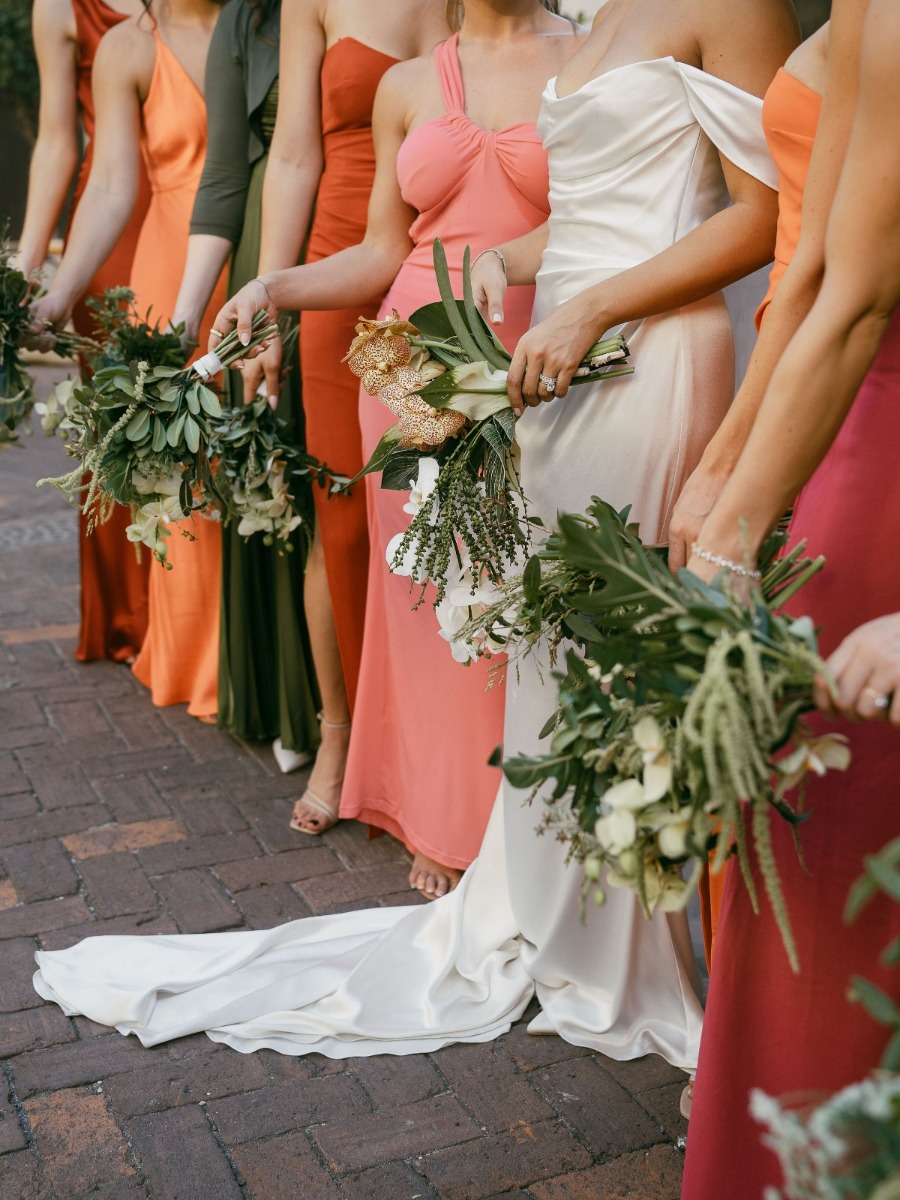 The bridesmaids set the color palette for this wedding in costa rica